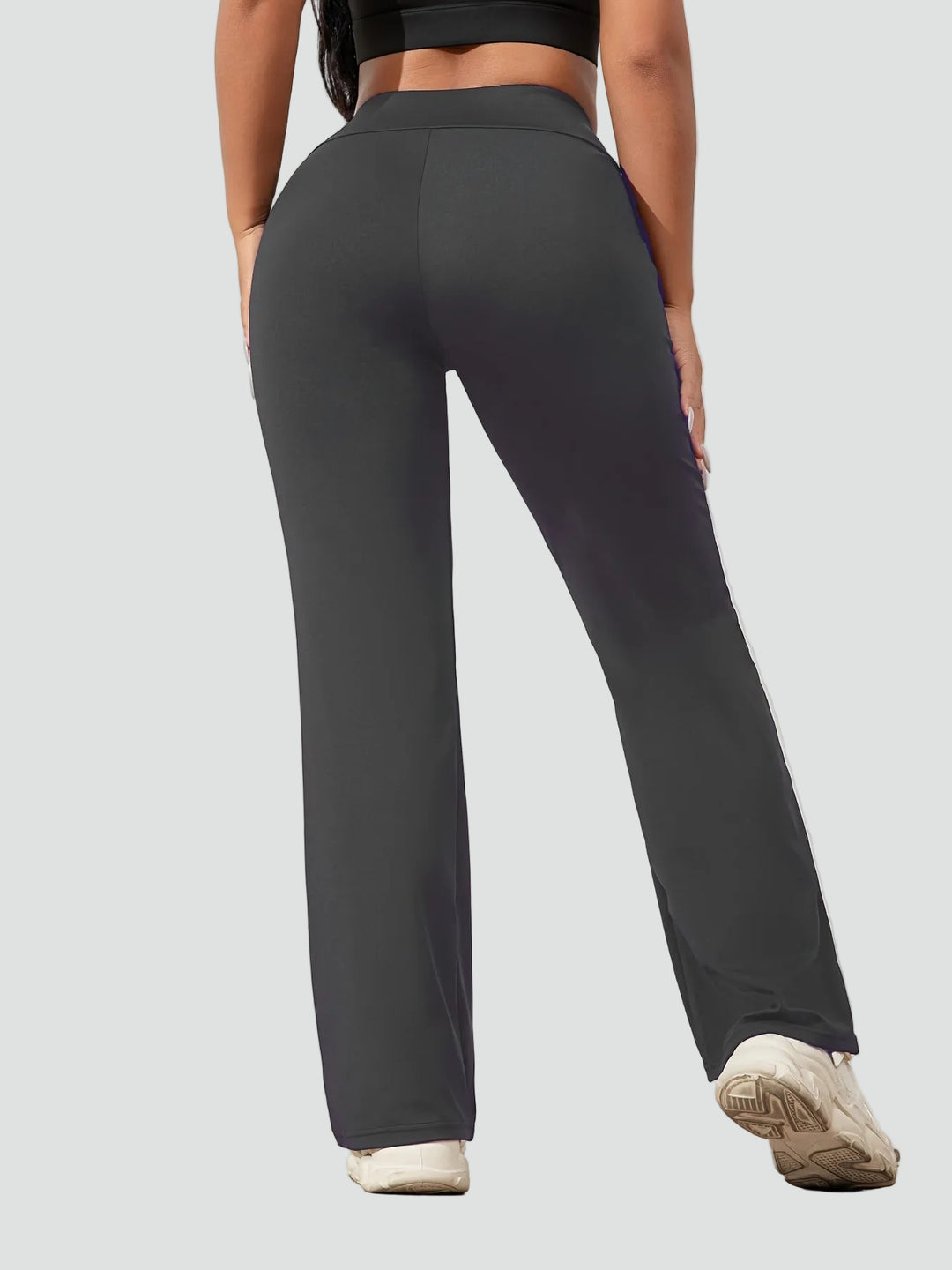 Damskie sportowe spodnie z wysokim stanem i szeroką nogawką