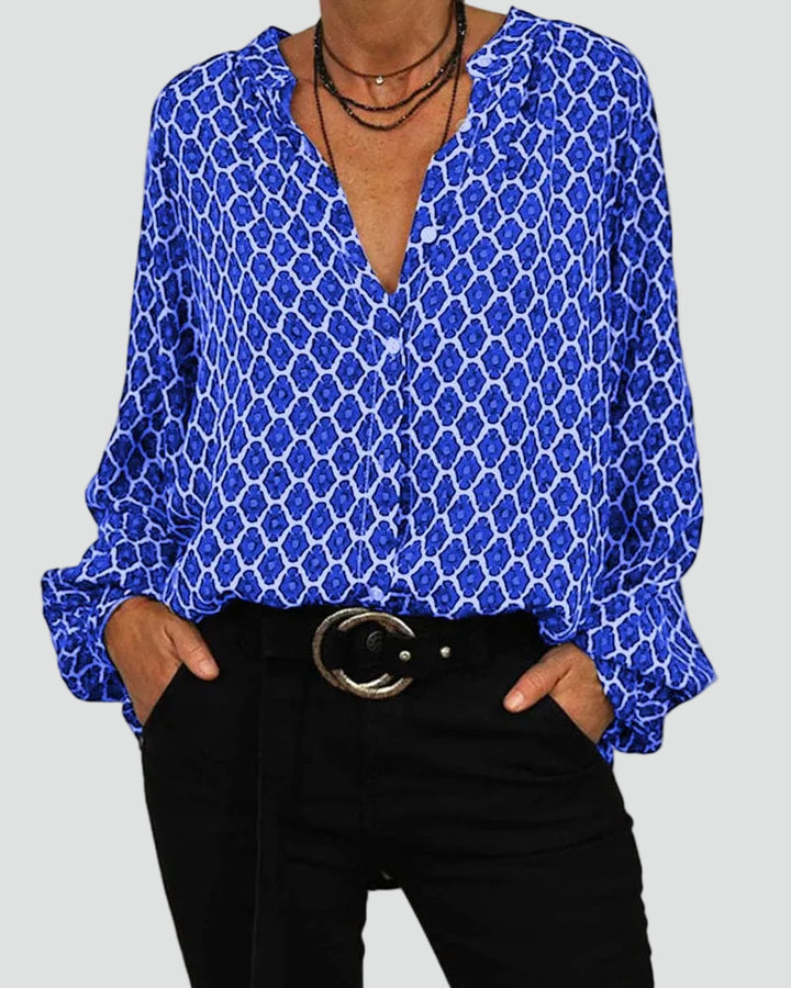Loose patterned women's shirt with V-neck and long sleeves