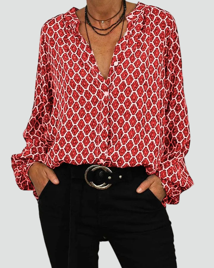 Loose patterned women's shirt with V-neck and long sleeves