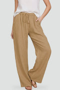Women’s linen trousers with wide legs and an elastic waistband