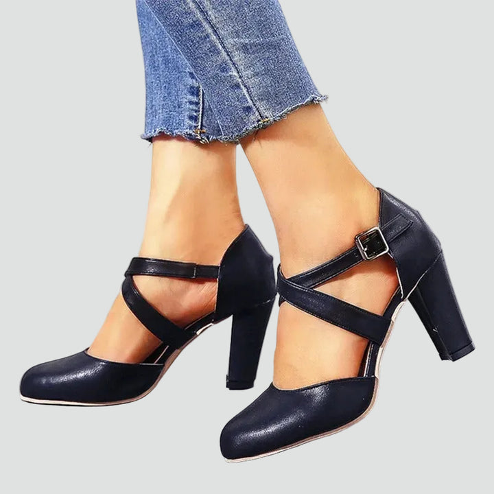 Block heel pumps with crisscross straps and an elegant design