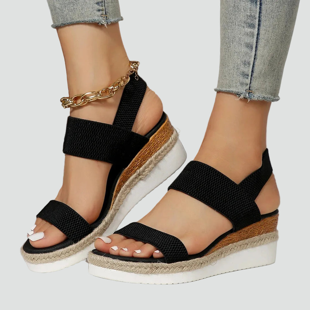 Wedge sandals with an elastodrill sole and wide straps