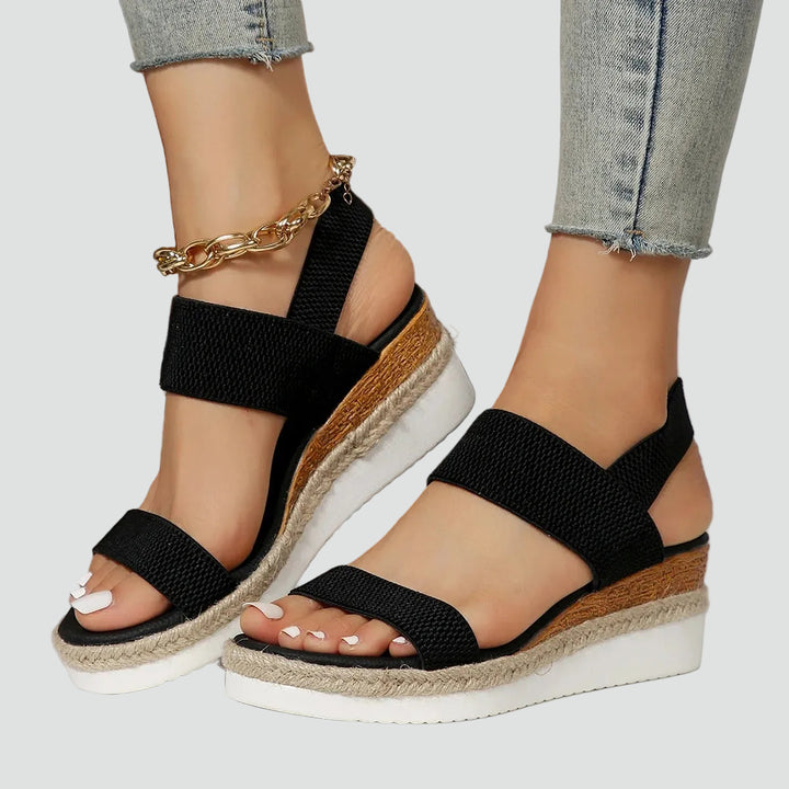 Wedge sandals with an elastodrill sole and wide straps