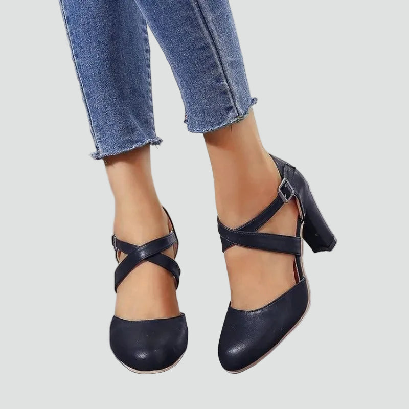 Block heel pumps with crisscross straps and an elegant design
