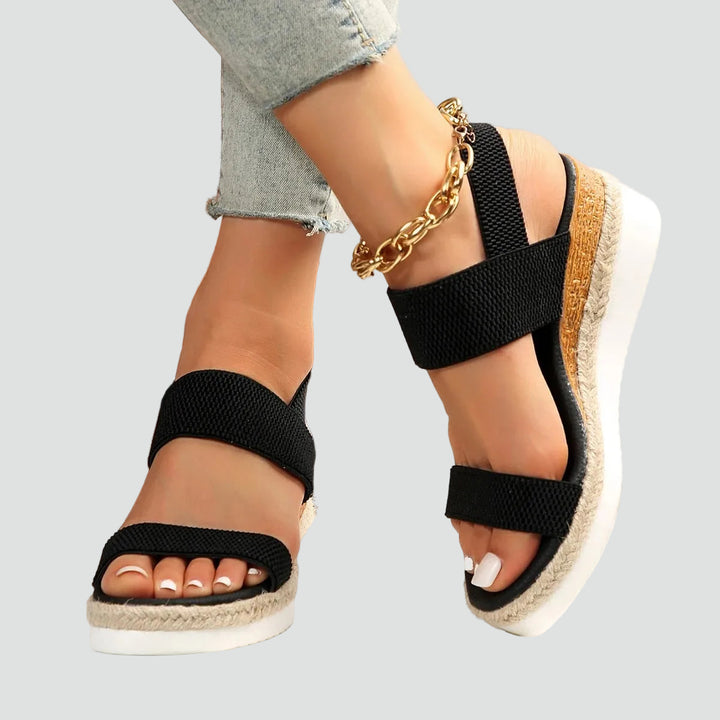 Wedge sandals with an elastodrill sole and wide straps