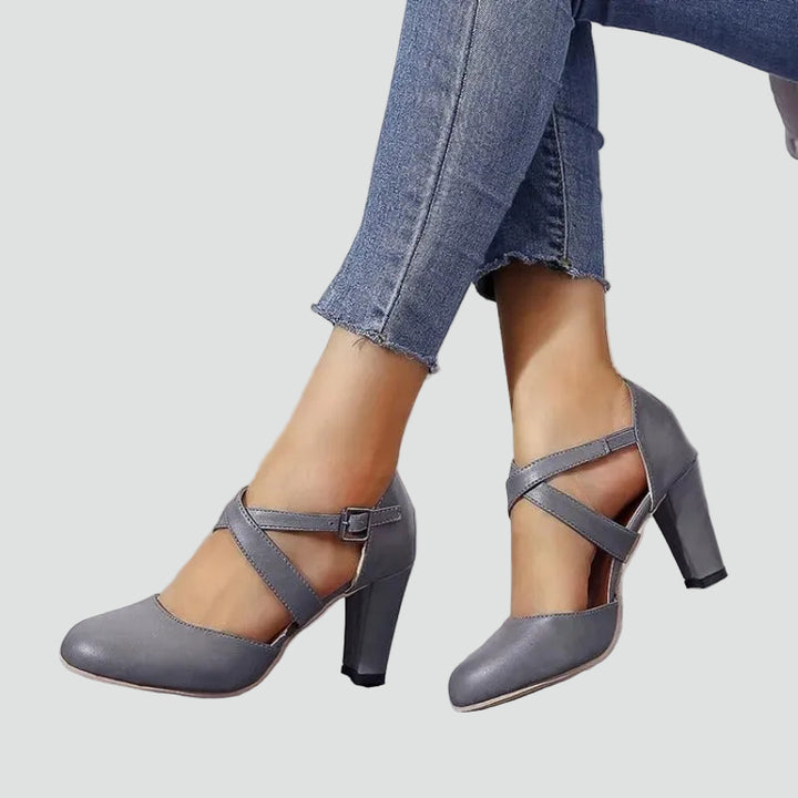 Block heel pumps with crisscross straps and an elegant design