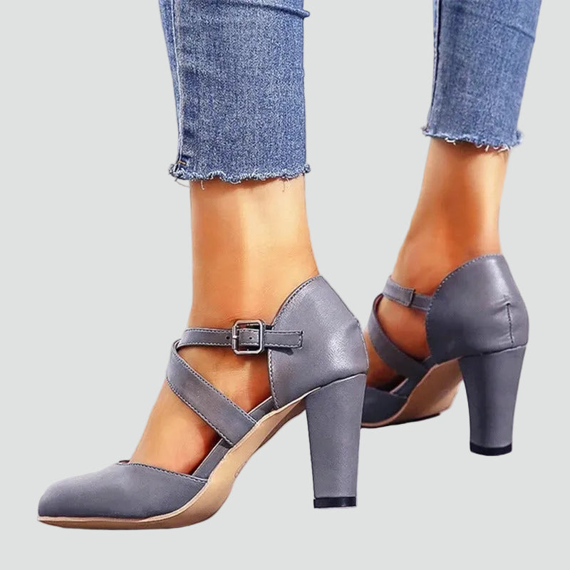 Block heel pumps with crisscross straps and an elegant design