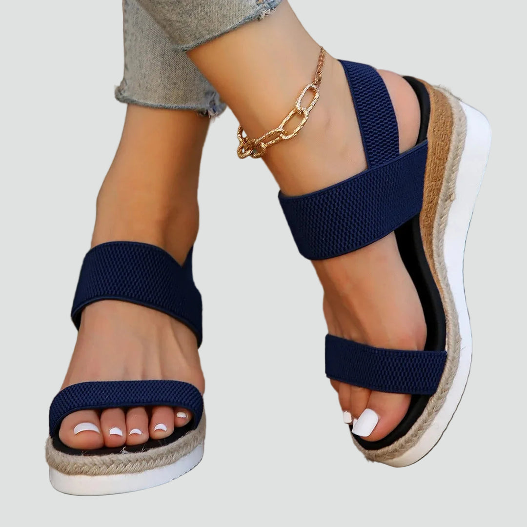 Wedge sandals with an elastodrill sole and wide straps