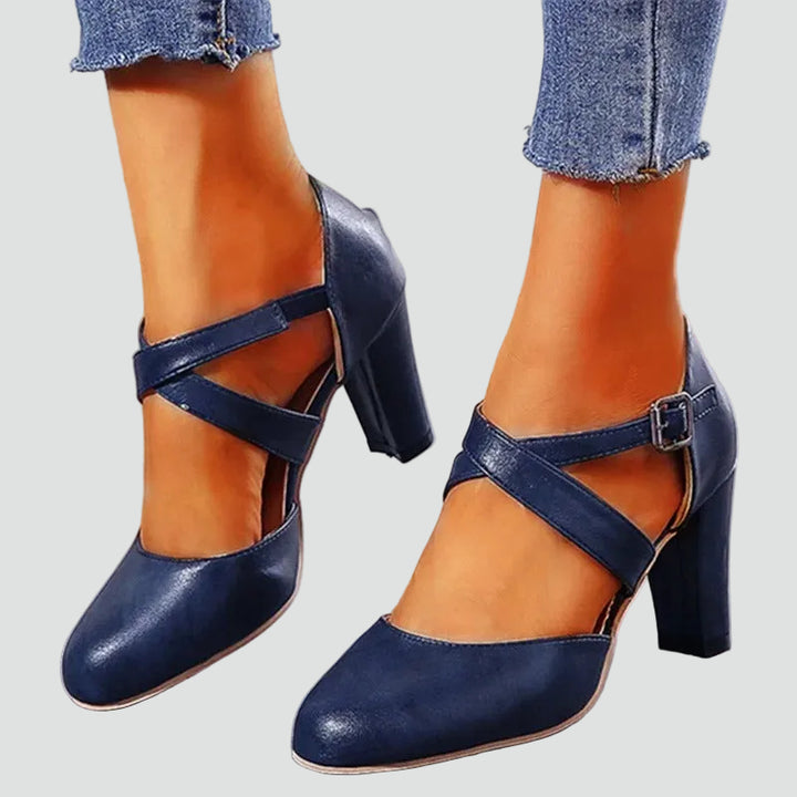 Block heel pumps with crisscross straps and an elegant design