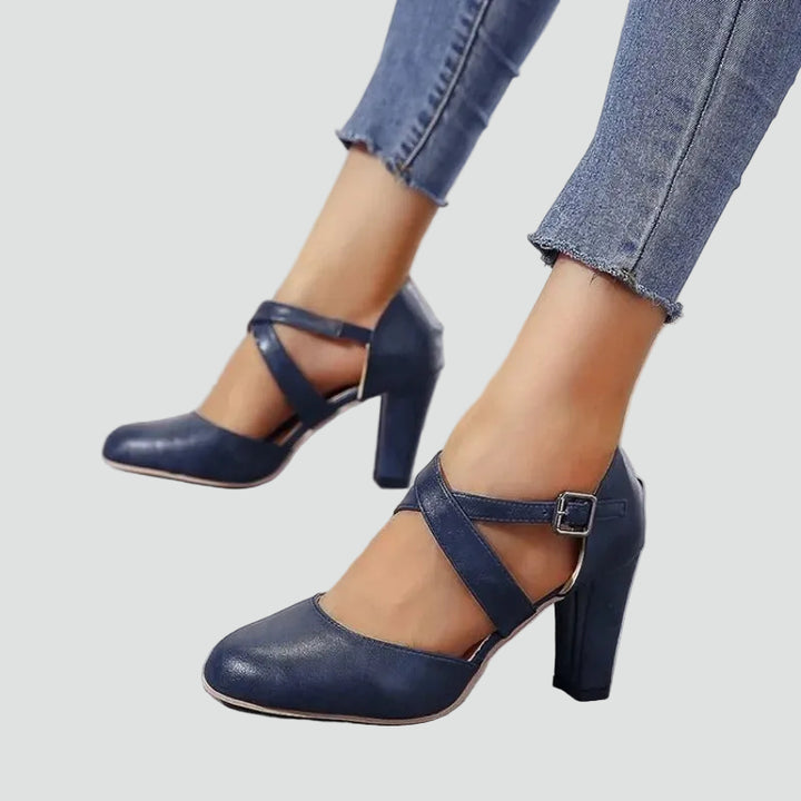 Block heel pumps with crisscross straps and an elegant design