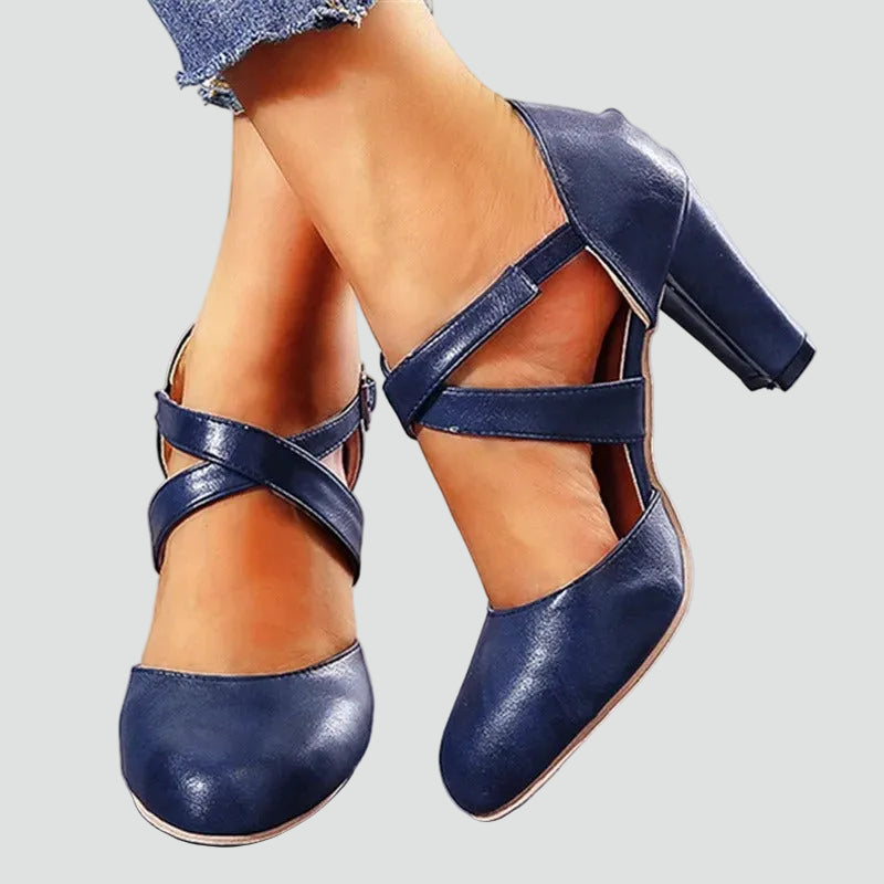 Block heel pumps with crisscross straps and an elegant design