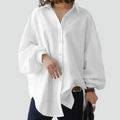 Elegant oversized women's blouse with wide sleeves