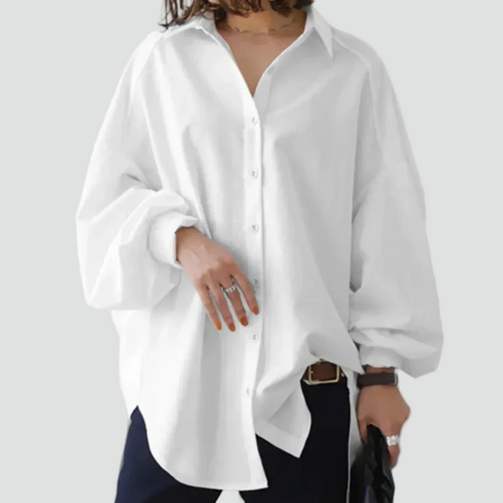 Elegant oversized women's blouse with wide sleeves