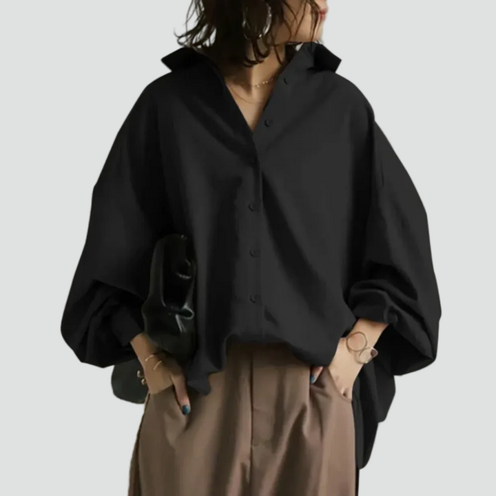 Elegant oversized women's blouse with wide sleeves