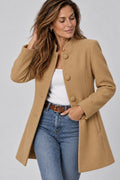 Elegant women's coat with a button-up stand collar for the office