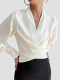 Elegant satin wrap blouse with V-neck and puff sleeves