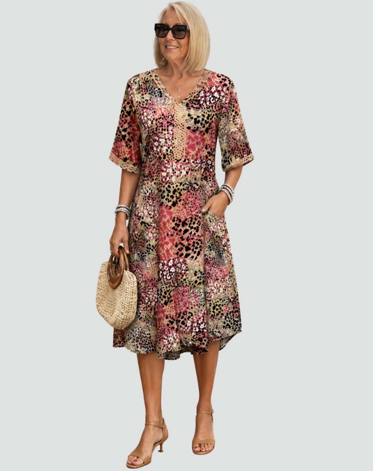 Robe à décolleté en V avec poches, idéale pour des sandales confortables.