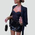 Jupe mini à sequins, parfaite pour les sorties en soirée.