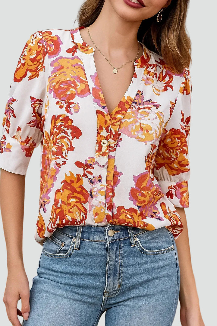Floral blouse with V-neck and puff sleeve
