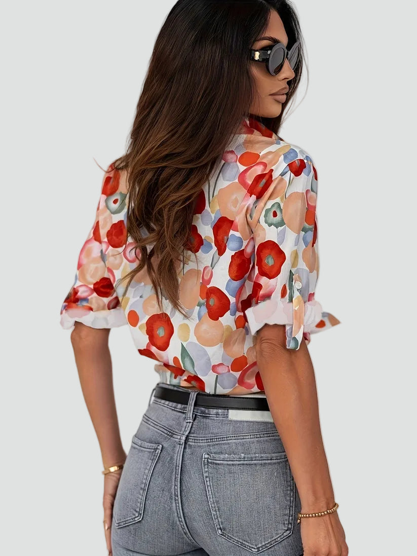 Elegant women's blouse with floral print and button closure
