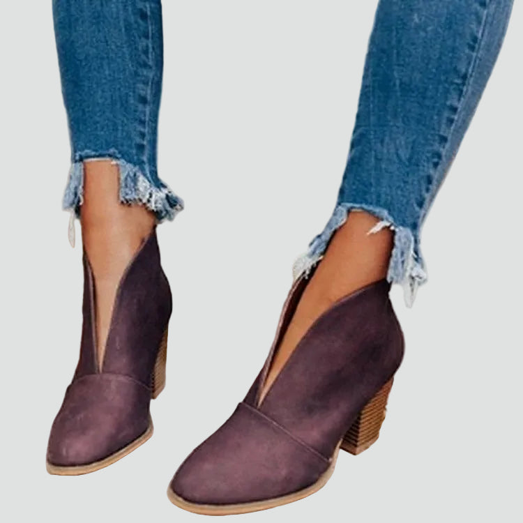 Block heel pumps with a deep cutout and elegant design